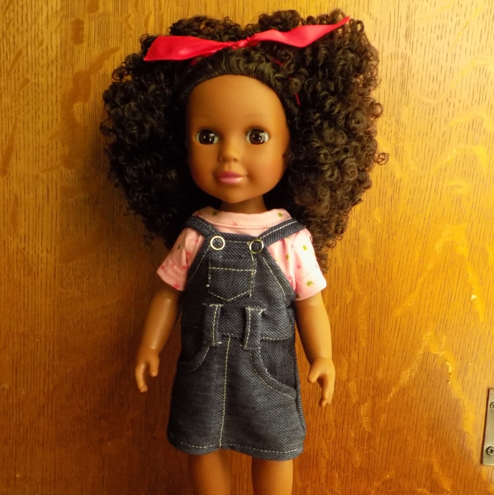 Cute curly haired doll